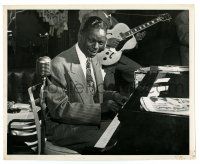 3y670 NAT KING COLE 8.25x10 still '45 playing piano by a microphone with guitar player behind him!