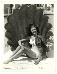 3y776 RITA HAYWORTH 8x10.25 still '40s wonderful sexy swimsuit image seated in giant clamshell!
