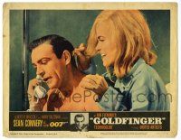 3z662 GOLDFINGER LC #2 '64 c/u of sexy Shirley Eaton behind Sean Connery as James Bond on phone!