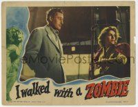 3z098 I WALKED WITH A ZOMBIE LC '43 Val Lewton, Jacques Tourneur, Tom Conway stares at Frances Dee