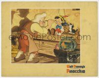 3z837 PINOCCHIO LC '40 Disney classic cartoon, close up of Gepetto painting the puppet's face!