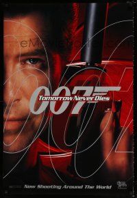 4d765 TOMORROW NEVER DIES teaser DS 1sh '97 close-up of Pierce Brosnan as James Bond 007!