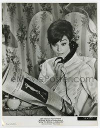 4m429 HOW TO STEAL A MILLION 7.5x9.75 still '66 close up of Audrey Hepburn with newspaper & phone!
