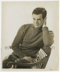 4m723 ROBERT RYAN 8.25x9.75 key book still '48 sitting on chair with sweater & hand behind his head!