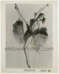 4m891 WORDS & MUSIC 8x10.25 still '49 art of sexy showgirl kicking her leg in the air!