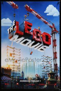 5c439 LEGO MOVIE teaser DS 1sh '14 cool image of title assembled w/cranes & plastic blocks!