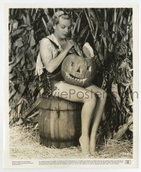 5d389 GLORIA DICKSON 8.25x10 still '40 in skimpy outfit having fun carving a Halloween pumpkin!