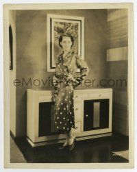 5d737 PRIVATE LIVES 8x10.25 still '31 full-length Norma Shearer wearing polka dots by deco cabinet
