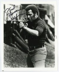 5t576 FRED WILLIAMSON signed 8x10 REPRO still '80s great close up aiming machine gun!