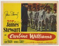5t051 CARBINE WILLIAMS signed LC #6 '52 by James Stewart, who's close up with other prisoners!