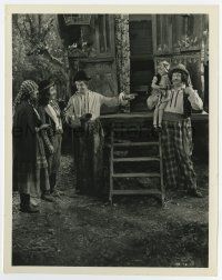 6a245 BOHEMIAN GIRL 8x10.25 still '36 Stan Laurel points to Oliver Hardy holding tiny Darla Hood!