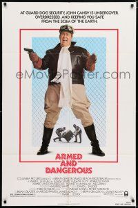 6f047 ARMED & DANGEROUS 1sh '86 wacky security guard John Candy, undercover & overdressed!