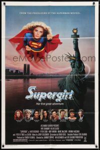 6f841 SUPERGIRL 1sh '84 super Helen Slater in costume flying over Statue of Liberty!