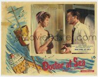 6g203 DOCTOR AT SEA English LC '55 Dirk Bogarde stares at sexy Brigitte Bardot only wearing towel!