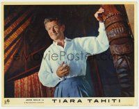 6g859 TIARA TAHITI English LC '62 close up of John Mills standing by cool carved wooden pole!
