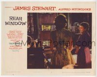 6g019 REAR WINDOW LC #2 '54 Alfred Hitchcock, Jimmy Stewart, Grace Kelly & Ritter look out window!