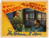 6g973 WOMAN I LOVE LC '37 Miriam Hopkins stares down at surprised military officer Paul Muni!