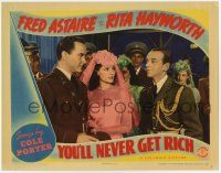 6g989 YOU'LL NEVER GET RICH LC '41 Rita Hayworth between John Hubbard glaring at Fred Astaire!