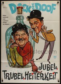 6s514 BLOTTO German R60s wacky art of Stan Laurel with laughing Oliver Hardy inside bottle!