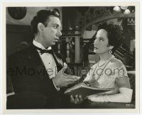 6x159 DEEP IN MY HEART 8.25x10 key book still '54 Ferrer tries to sell something to Merle Oberon!