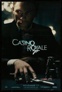 7g120 CASINO ROYALE teaser DS 1sh '06 Daniel Craig as James Bond at poker table with gun!