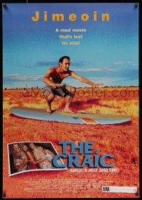 7g153 CRAIC 1sh '99 wacky Alan McKee surfing in field, a road movie that's lost its way!