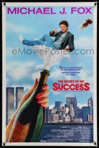7g670 SECRET OF MY SUCCESS 1sh '87 wacky image of Michael J. Fox & huge bottle of champagne!