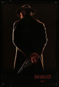 7g804 UNFORGIVEN dated teaser 1sh '92 classic image of gunslinger Clint Eastwood w/back turned!