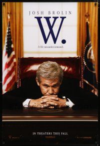7g816 W. teaser DS 1sh '08 Josh Brolin as George W. Bush at his desk in the Oval Office!