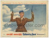7j111 CALAMITY JANE LC #1 '53 best close up of Doris Day in buckskin pointing both guns in the air!