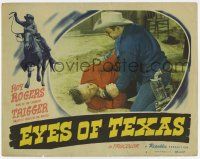 7j214 EYES OF TEXAS LC #3 '48 close up of hero Roy Rogers pinning a bad guy to the ground!