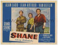 7j042 SHANE LC #6 '53 posed studio portrait of Alan Ladd, Jean Arthur & Van Heflin with guns!