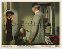 7m011 BREAKFAST AT TIFFANY'S color 8x10 still '61 Audrey Hepburn wearing hat stares at Peppard!