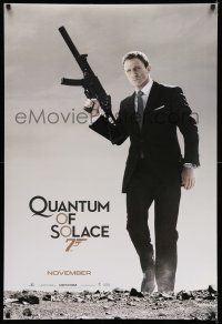 7r579 QUANTUM OF SOLACE teaser DS 1sh '08 Daniel Craig as Bond with silenced H&K UMP submachine gun