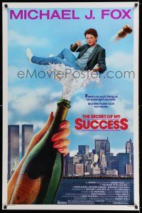 7r641 SECRET OF MY SUCCESS 1sh '87 wacky image of Michael J. Fox & huge bottle of champagne!