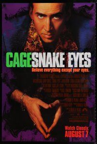 7r661 SNAKE EYES advance DS 1sh '98 close-up of Nicolas Cage, believe everything except your eyes!
