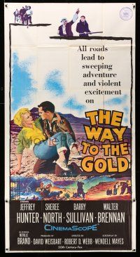8g974 WAY TO THE GOLD 3sh '57 great image of Jeffrey Hunter carrying wounded Sheree North!