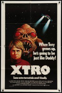 8p989 XTRO 1sh '83 some extra-terrestrials aren't friendly, he's the mean E.T.!