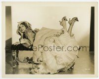 8s410 JEANETTE MACDONALD 8x10.25 still '35 in costume lying on bench from Naughty Marietta!
