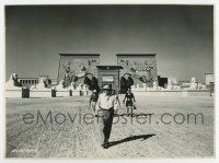 8s874 TEN COMMANDMENTS candid 7x9.75 still '56 Cecil B. DeMille walks in desert in front of huge set