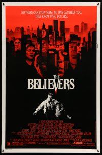 8w067 BELIEVERS 1sh '87 Martin Sheen, Robert Loggia, nothing can stop them, cool image of skyline!