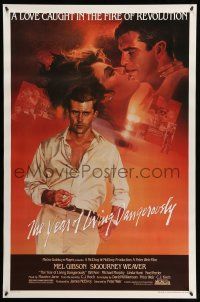 8w846 YEAR OF LIVING DANGEROUSLY 1sh '83 Peter Weir, great artwork of Mel Gibson by Stapleton!
