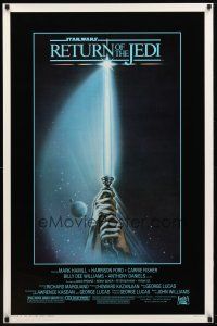9c019 RETURN OF THE JEDI 1sh '83 George Lucas, art of hands holding lightsaber by Tim Reamer!