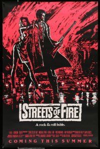9c703 STREETS OF FIRE advance 1sh '84 Walter Hill, cool pink dayglo Riehm art!