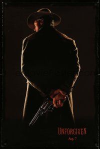 9c791 UNFORGIVEN dated teaser DS 1sh '92 classic image of gunslinger Clint Eastwood w/back turned!