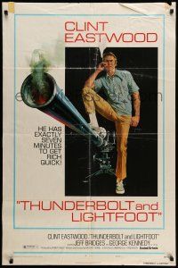 9f889 THUNDERBOLT & LIGHTFOOT style C 1sh '74 artwork of Clint Eastwood with HUGE gun by McGinnis!