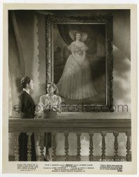 9h742 REBECCA 8x10.25 still R48 Joan Fontaine & Judith Anderson by huge painting, Hitchcock!