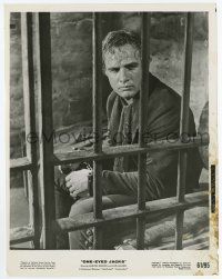 9h681 ONE EYED JACKS 8x10.25 still '61 close up of Marlon Brando handcuffed in prison cell!