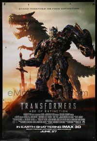9j469 TRANSFORMERS: AGE OF EXTINCTION IMAX DS bus stop '14 image of Prime, Wahlberg & dinobot!