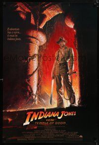 9k361 INDIANA JONES & THE TEMPLE OF DOOM 1sh '84 adventure is Ford's name, Bruce Wolfe art!